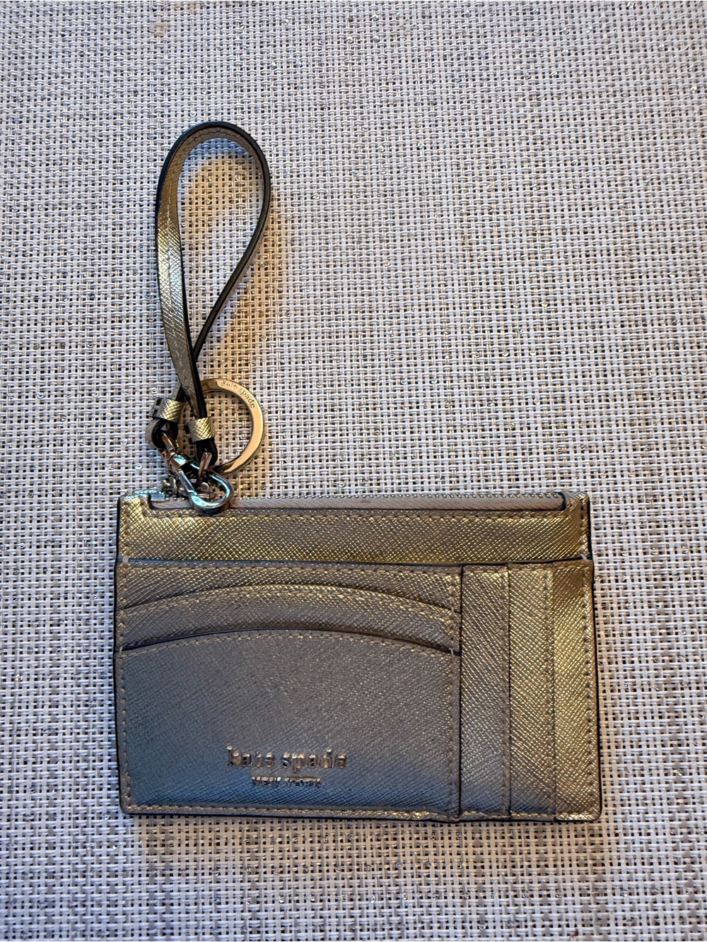 kate spade metallic gold wristlet cardholder